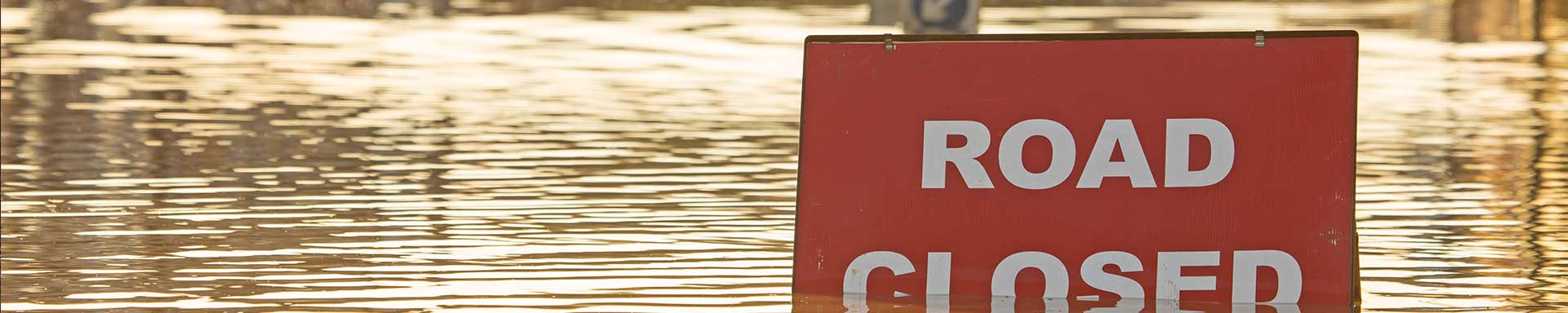 flooded road closed sign